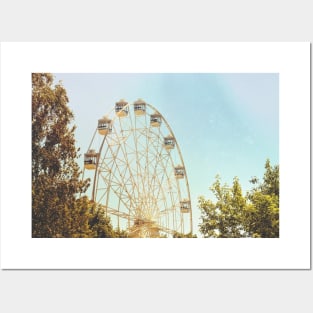 Ferris wheel between trees vintage Posters and Art